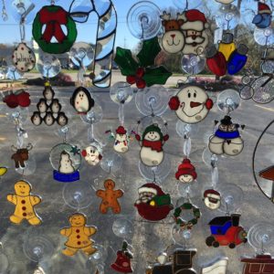 Assortment of stained glass suncatchers Assortment of stained glass suncatchers