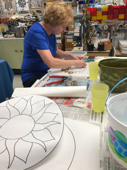 Student Laying out DiamondCrete Stepping Stone