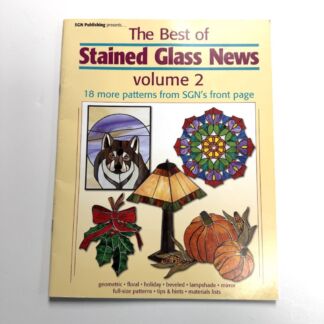 Cover of 'The Best of Stained Glass News' Volume 2, showing a collage of colorful stained-glass patterns (dog portrait, mandala, pumpkin, lamp, holly).