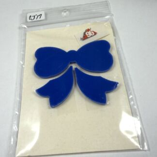 Blue bow-shaped decorative cutout mounted on a white card inside a clear plastic bag.