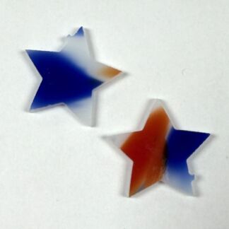 Two torn-paper stars with blue and red gradient on white background (patriotic-themed decoration).