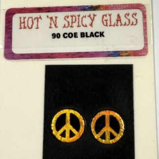 Gold peace-sign stud earrings on a black display with a pink-bordered label reading 'HOT N SPICY GLASS' and '90 COE BLACK' above.