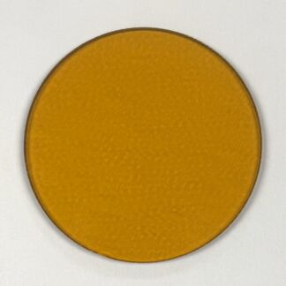 Orange round cookie on a white background, smooth surface with slight edge shadow